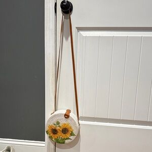 Round White Crossbody Bag with Sunflower Design